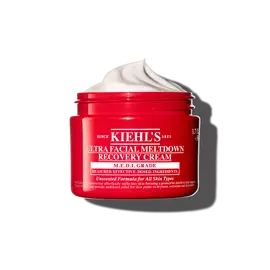 Červena nadobka kremu Kiehl’s Ultra Facial Meltdown Recovery Cream Whip s texturou našľahaneho kremu.