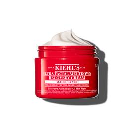 Červena nadobka kremu Kiehl’s Ultra Facial Meltdown Recovery Cream Whip s texturou našľahaneho kremu.