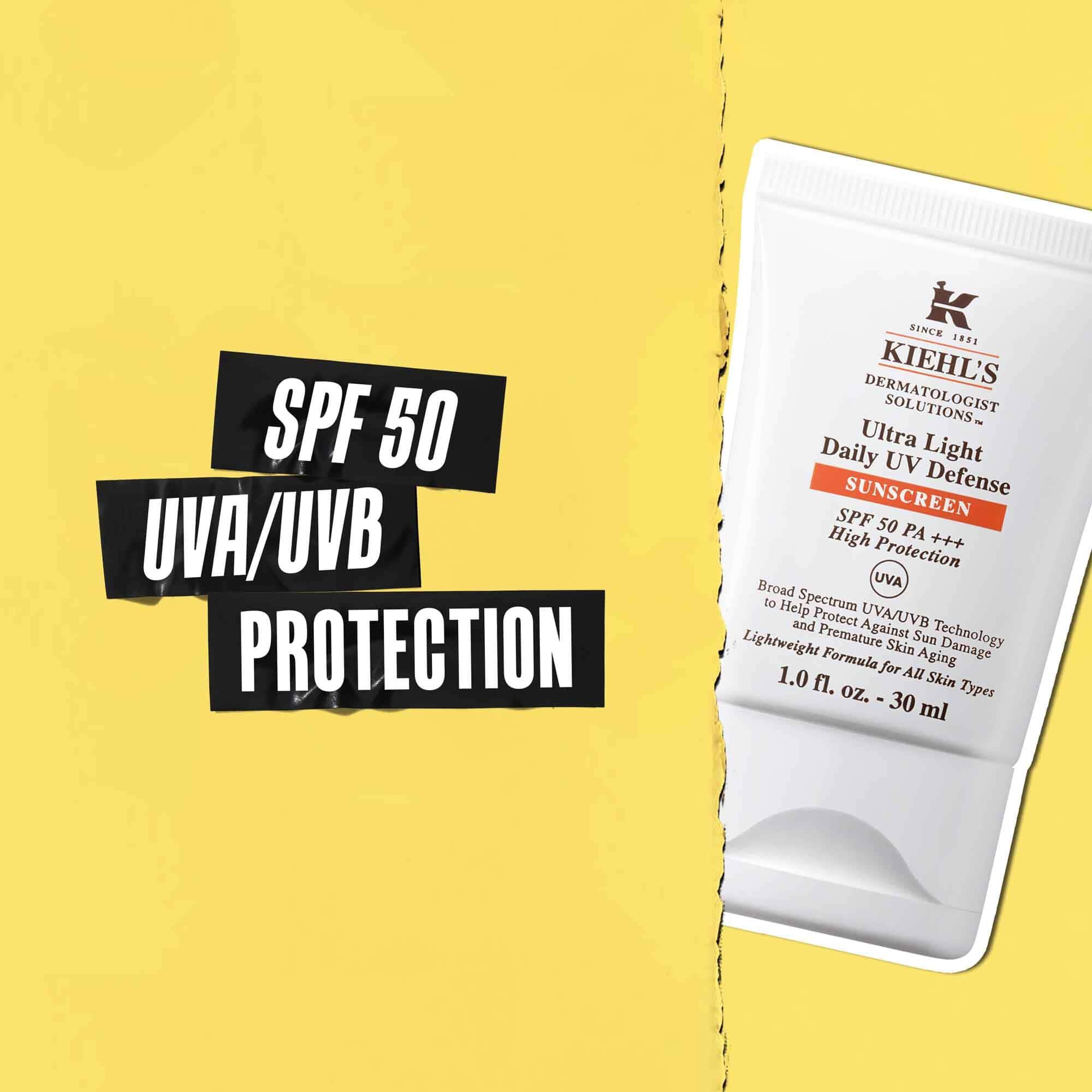 Napis SPF 50 UVA/UVB ochrana na čiernej paske s obrazkom tuby Ultra-Light Daily UV Defense vedľa nej.