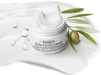 Kiehls Ultra Facial Cream s olivovym listom na bielom pozadi, určeny na hydratačnu starostlivosť o pleť.