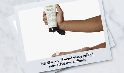 A hand pouring a non-greasy hair product into the palm, with text below that reads "Condition and smooth with a non-greasy formula."